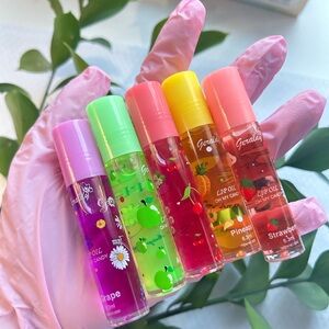 Set of  5 flavors Lip Oils , grape,strawberry,Cherry,Apple , pineaple.